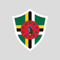 Dominica Flag in Shield Shape Frame vector