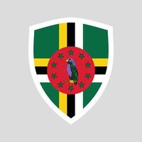 Dominica Flag in Shield Shape Frame vector