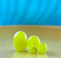 Grape berries that represent the family in a metaphorical way photo