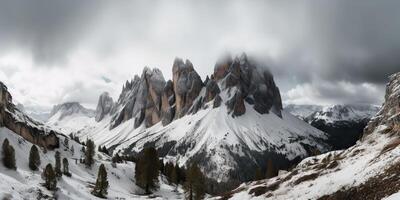 Cloud day rock hill mountain rock peak with snow at winter. Adventure expedition travel hiking scene view photo