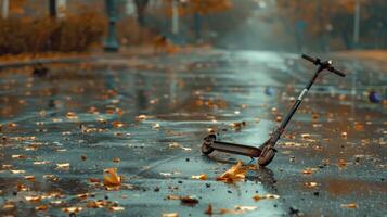 Close up of a wrecked electric scooter on road, depicting aftermath of significant crash photo