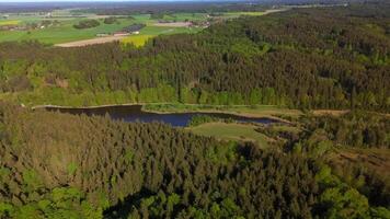 Deininger Weiher , Gleissental-Weiher natural marshy lake in Bavaria, Germany Sudliches Gleissental der Gemeinden Dingharting und Oberbiberg aerial view. Luftaufnahme des Sees Deininger Weiher. video