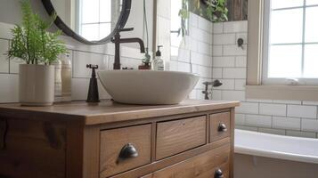 An image of a renovated bathroom featuring a new vanity and sink made out of a repurposed dresser exemplifying how to save money by repurposing existing furniture for a ne photo