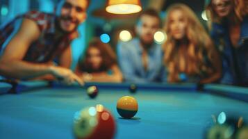 A group of friends gathered around a pool table engaged in a competitive game without needing a drink to enhance the experience photo