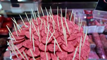 Sausage Samples Ready for Tasting, Toothpick-speared sausage slices on display. video