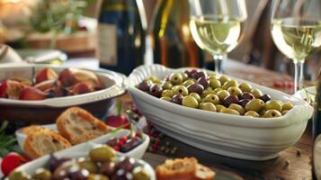 The unique flavors of kalamata castelvetrano and oilcured olives showcased in elegant individual tasting ss photo