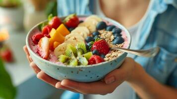 A teenager proudly shows off their smoothie bowl creation sticking to their personalized nutrition plan by incorporating a variety of fruits grains and proteins into their breakfast photo