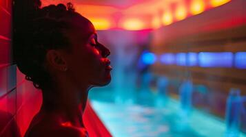 A person enjoying a postworkout sauna session with a display of the different membership levels and their corresponding prices. photo