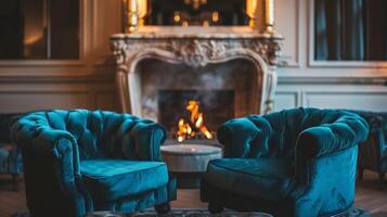 Velvet sofas and armchairs are positioned around the fireplace inviting guests to sink into their plush cushions and take in the warmth and beauty of the flickering 2d flat cartoon photo