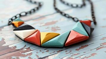 A clay necklace featuring a combination of geometric shapes and bold colors for a modern look. photo