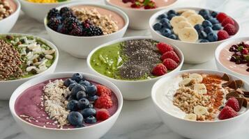A variety of smoothie bowls topped with fresh berries nuts and superfood powders providing a nutritious and energizing start to the day photo