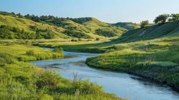 A serene landscape with rolling hills of greenery and a small river winding through all made from the clayrich soil of the area. photo