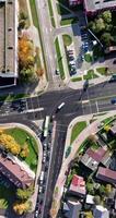 vertical accelerated aerial above road junction with heavy traffic video