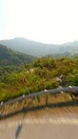 FPV flight over scenic winding mountain road on the Ha Giang Loop, North Vietnam video