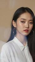 Beautiful young korean woman with long dark hair and bold makeup video