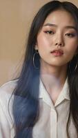 Beautiful young korean woman with long dark hair and bold makeup video