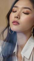 Beautiful young korean woman with long dark hair and bold makeup video