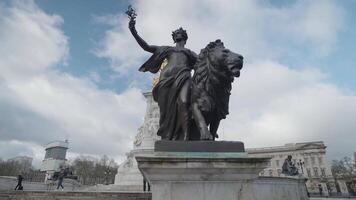 London, United Kingdom - The Victoria Memorial monument to Queen Victoria stands in front of Buckingham Palace video