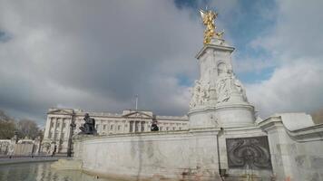 London, United Kingdom - The Victoria Memorial monument to Queen Victoria stands in front of Buckingham Palace video