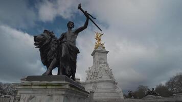 London, United Kingdom - The Victoria Memorial monument to Queen Victoria stands in front of Buckingham Palace video