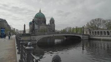 Berlin, Germany - April 5, 2024 - The Spree River with the Berliner Dom Cathedral in the background video
