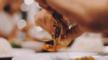 Shrimp in hand is prepared for cooking. video