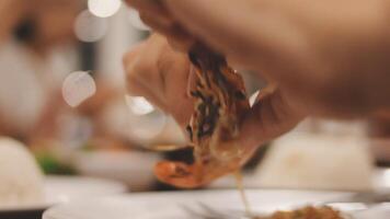 Shrimp in hand is prepared for cooking. video