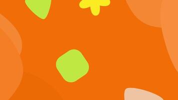 an orange background with a green leaf on it video