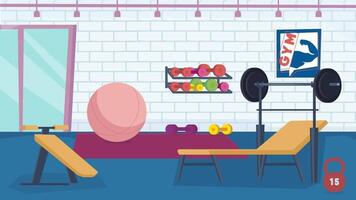 a gym room with weights, exercise equipment and a mirror video