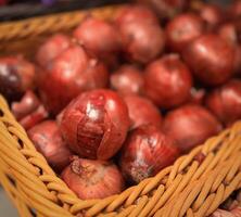 Red onions background photo