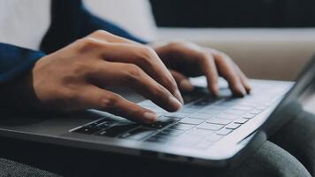 Woman working at home office hand on keyboard close up video