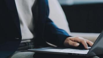 Woman working at home office hand on keyboard close up video