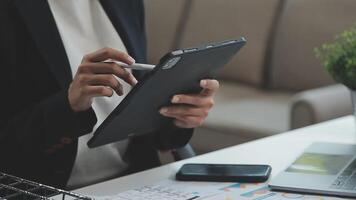 Co working conference, Business team meeting present, investor colleagues discussing new plan financial graph data on office table with laptop and calculator, Finance, accounting, investment. video