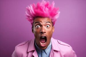 The pink haired man appears surprised, his eyes wide and his mouth hanging open. photo