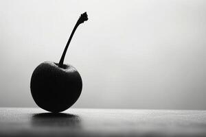 High contrast silhouette of a cherry, black and white minimalist art photo