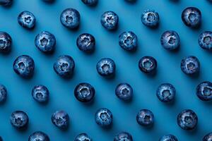 Top view of a many blueberry on a navy blue background photo