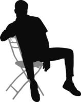 Silhouette man sitting on armchair vector
