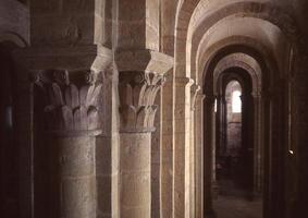 the inside of a building with stone columns photo