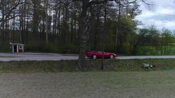 klassiek rood sport- auto 4k achtergrond video