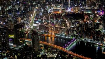 antenne visie van tokyo stad lichten Bij nacht 4k achtergrond video