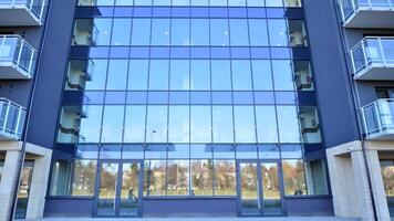 Modern architecture of urban residential apartment building. Apartment building exterior, residential house facade. photo