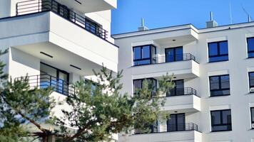 Residential area with modern apartment building. Multi Storey modern, new and stylish living block of flats. photo