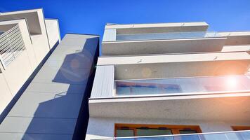 Modern architecture of urban residential apartment building. Apartment building exterior, residential house facade. photo