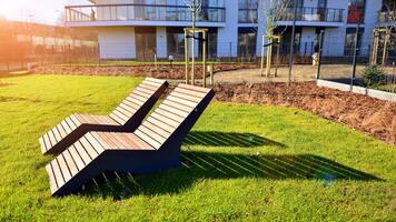 Wooden benches in a beautiful park garden. photo