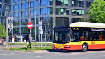 Warsaw, Poland. 11 April 2024. Car traffic at rush hour in downtown area of the city. City center with cars and buildings in the background. photo