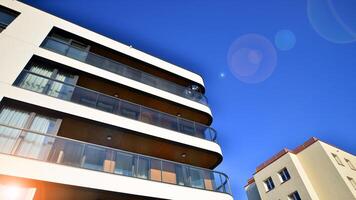 Modern architecture of urban residential apartment building. Apartment building exterior, residential house facade. photo