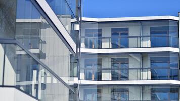 Modern architecture of urban residential apartment building. Apartment building exterior, residential house facade. photo