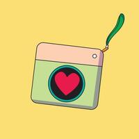cute camera with a heart in the middle vector