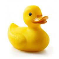 Bright yellow rubber duck isolated on a white background photo