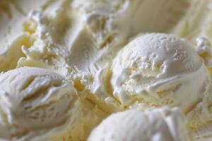 Close up image of creamy vanilla ice cream scoops, perfect for summer refreshment themes and National Ice Cream Day promotions photo